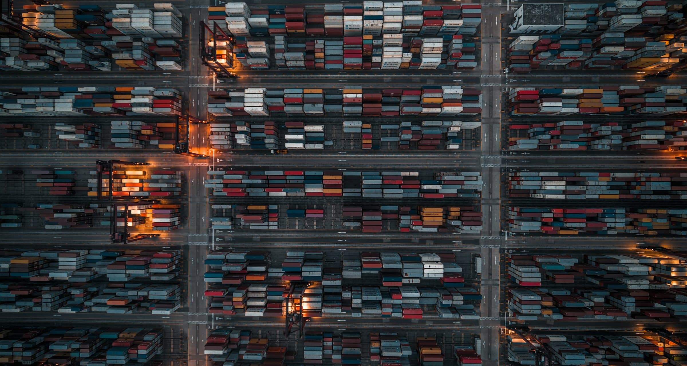 Aerial view of a large logistics yard at night