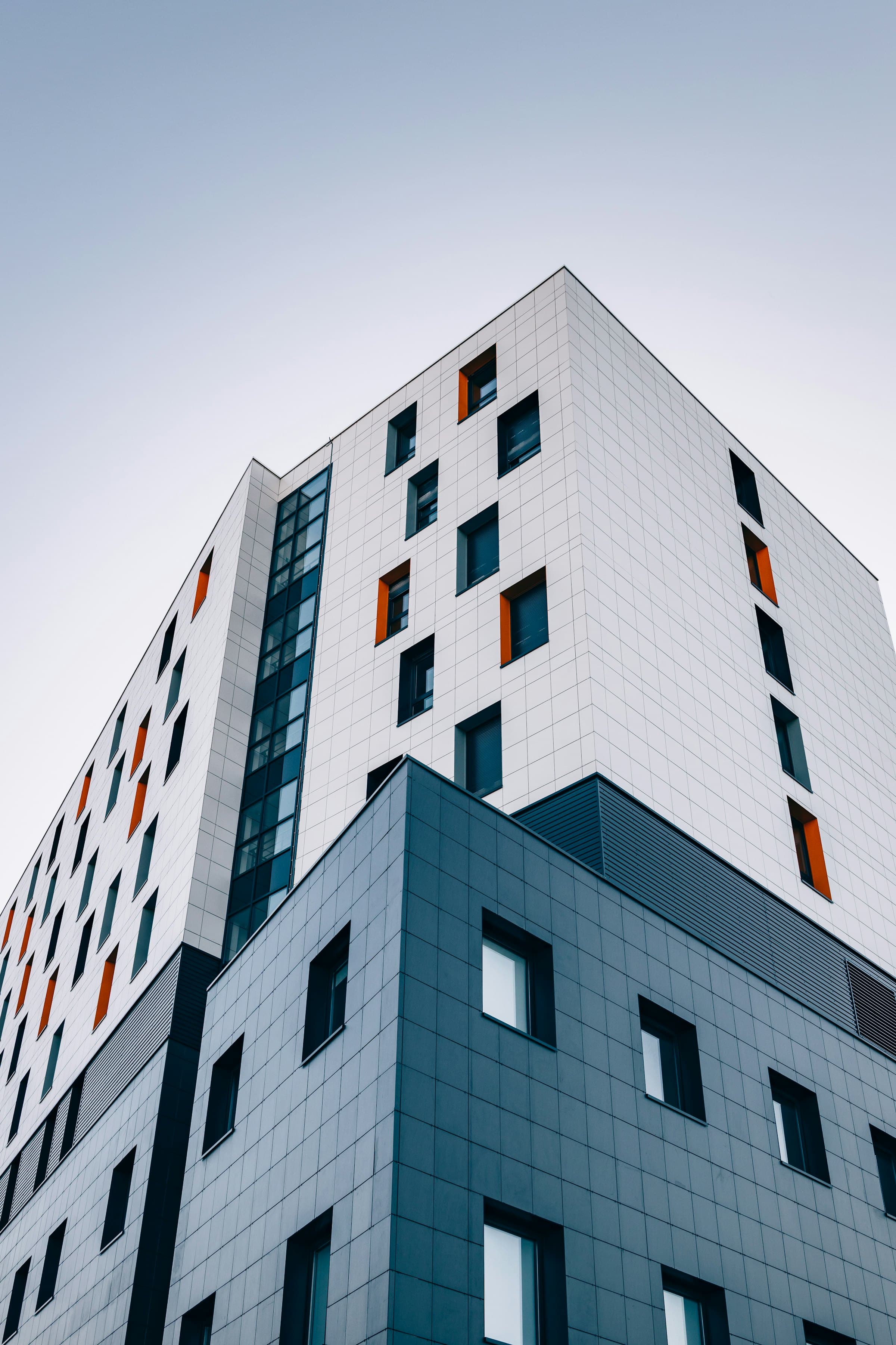 White and dark-panelled hospitality building