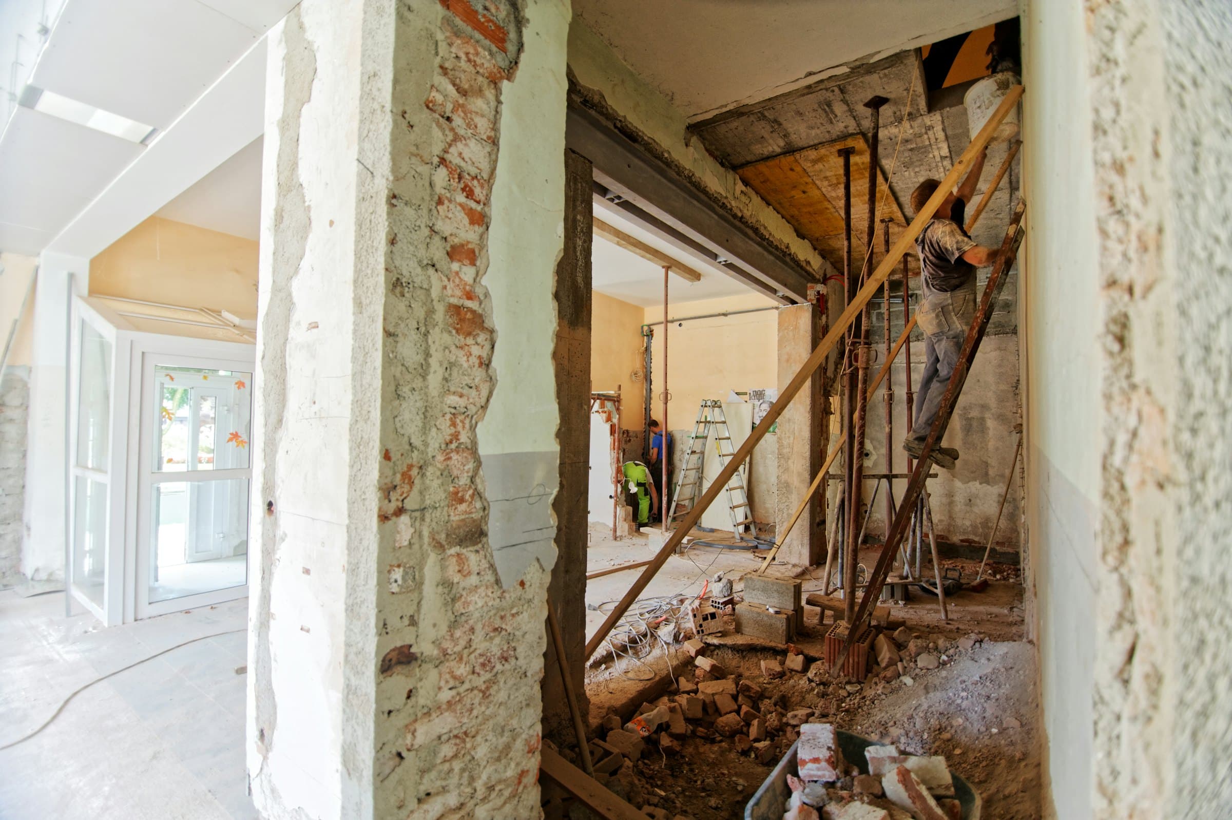 Interior under refurbishment with exposed structure and stud walls